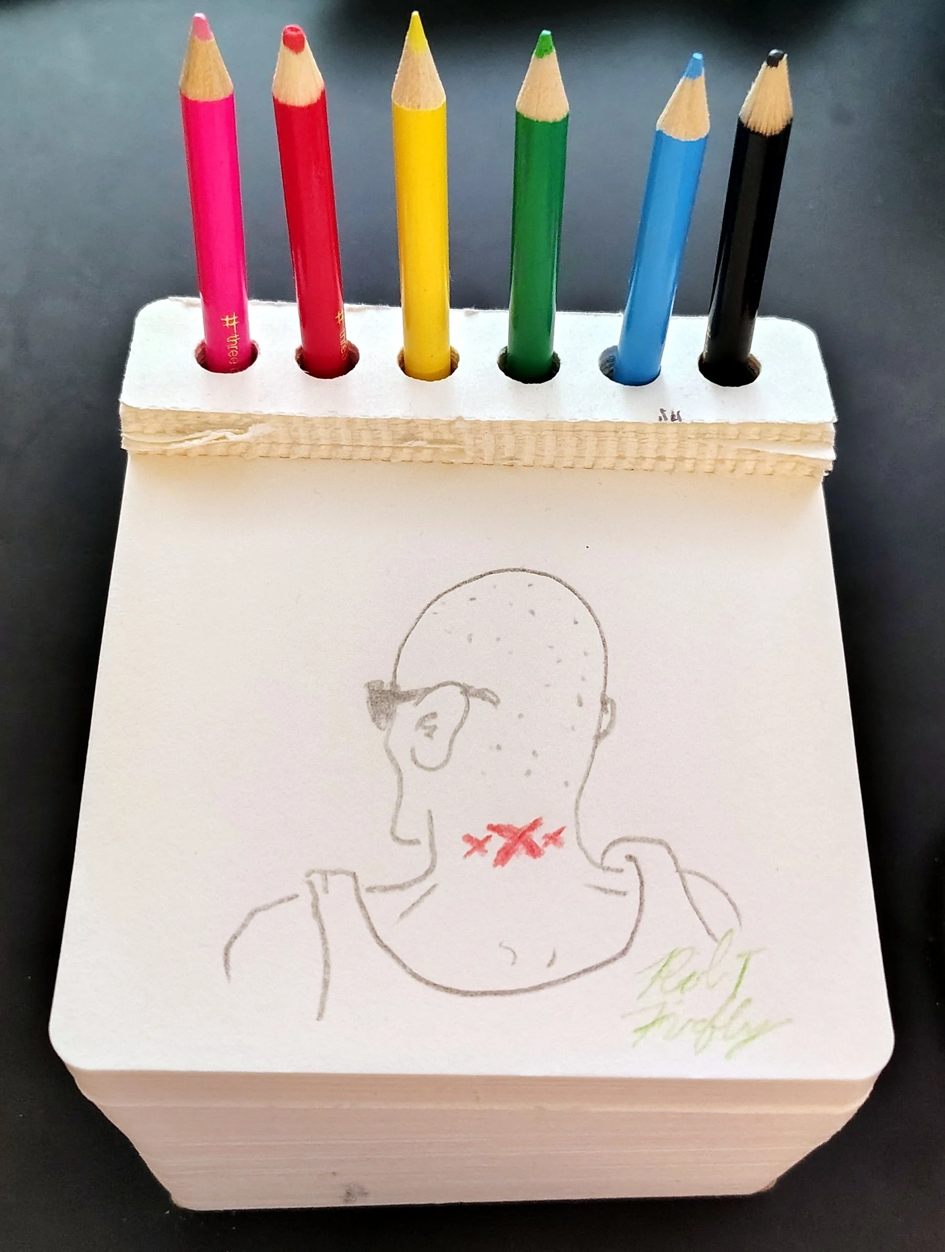 Colored pencil doodle on a notepad of the back of Vin Diesel's head with a red "XXX" tattoo on the back of his neck, like in the posters for the film "XXX."